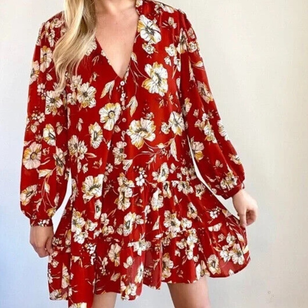 Emma and Michele dress long-sleeved, rust-colored with a floral pattern